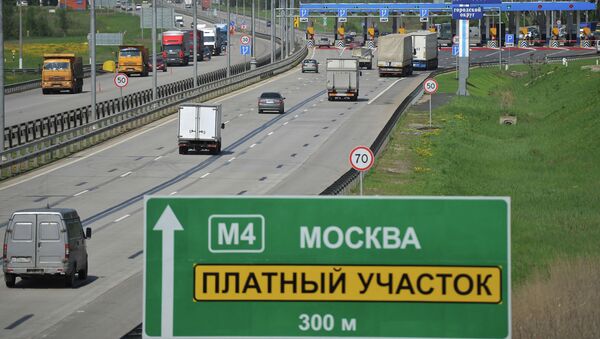 Платный участок автомобильной дороги. Архивное фото Платный участок автомобильной дороги. Архивное фото