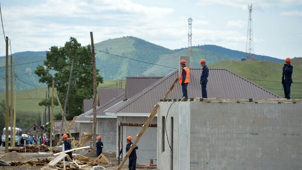 Строительство домов для пострадавших от пожаров жителей села Усть-Бюр в Хакасии