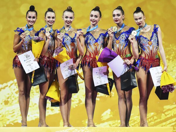 Спортсменки сборной России по художественной гимнастике Анастасия Татарева, Ксения Полякова, Мария Кравцова, Евгения Леванова, Мария Толкачева, Анастасия Шишмакова (слева направо) Спортсменки сборной России по художественной гимнастике Анастасия Татарева, Ксения Полякова, Мария Кравцова, Евгения Леванова, Мария Толкачева, Анастасия Шишмакова (слева направо)